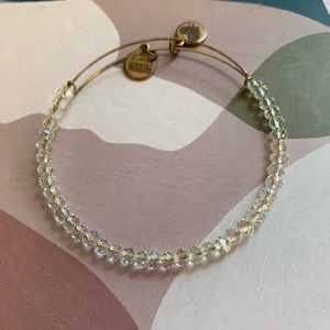 2 gold Alex and Ani bracelets